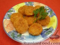 Фото к рецепту: Ароматные котлетки из курицы и сыра