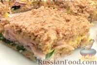 Фото к рецепту: Сэндвич с ветчиной и рукколой